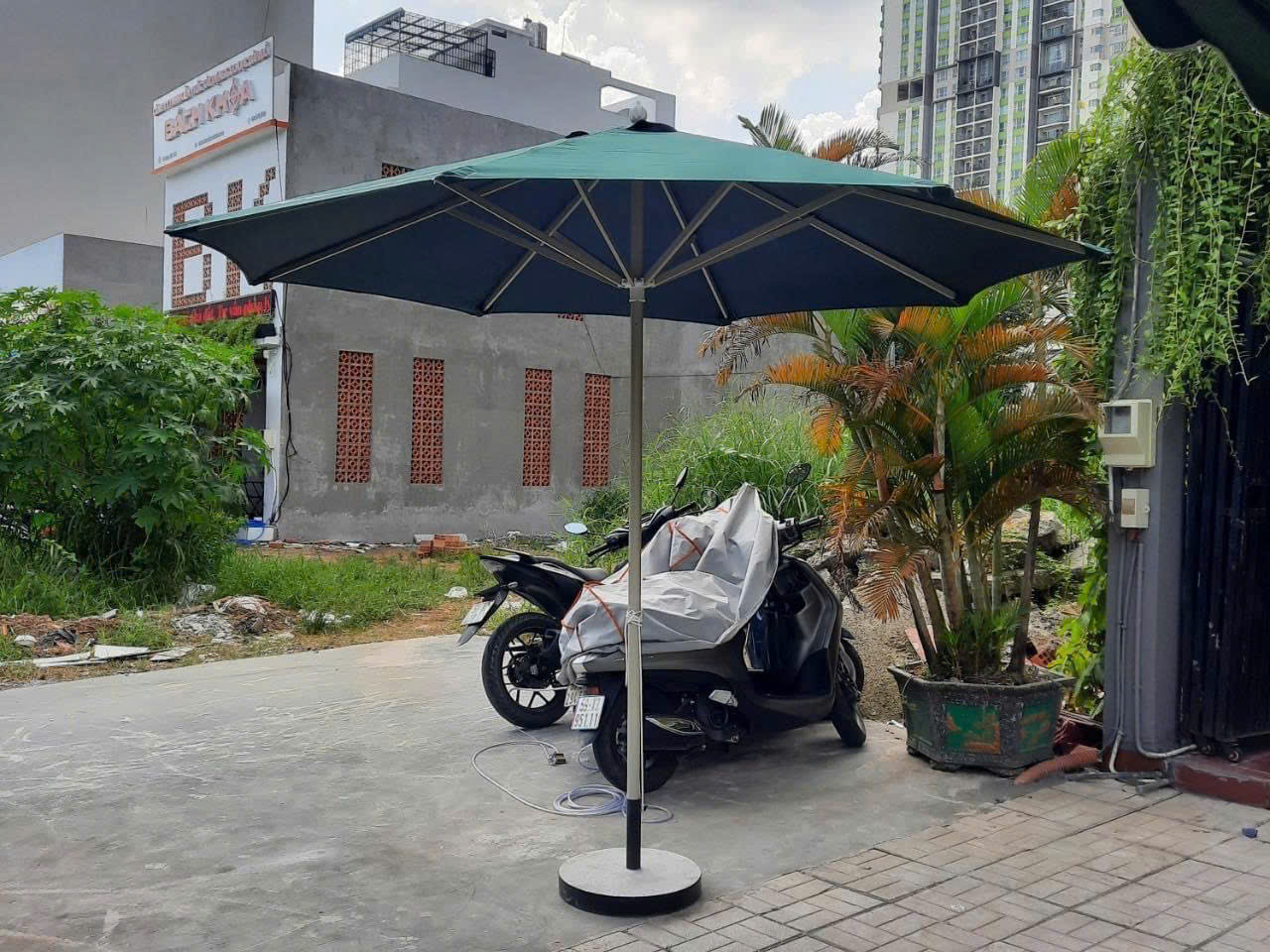 Dù che nắng tại Dĩ An, TPHCM - Mẫu dù tròn đúng tâm 3m màu xanh rêu