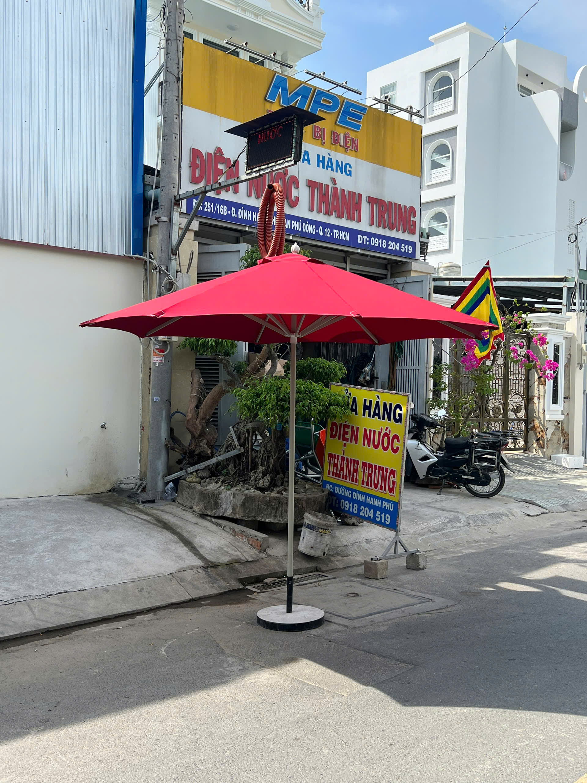 Dù che nắng tại Vĩnh Cửu - mẫu dù tròn 3m sắt sơn tĩnh điện
